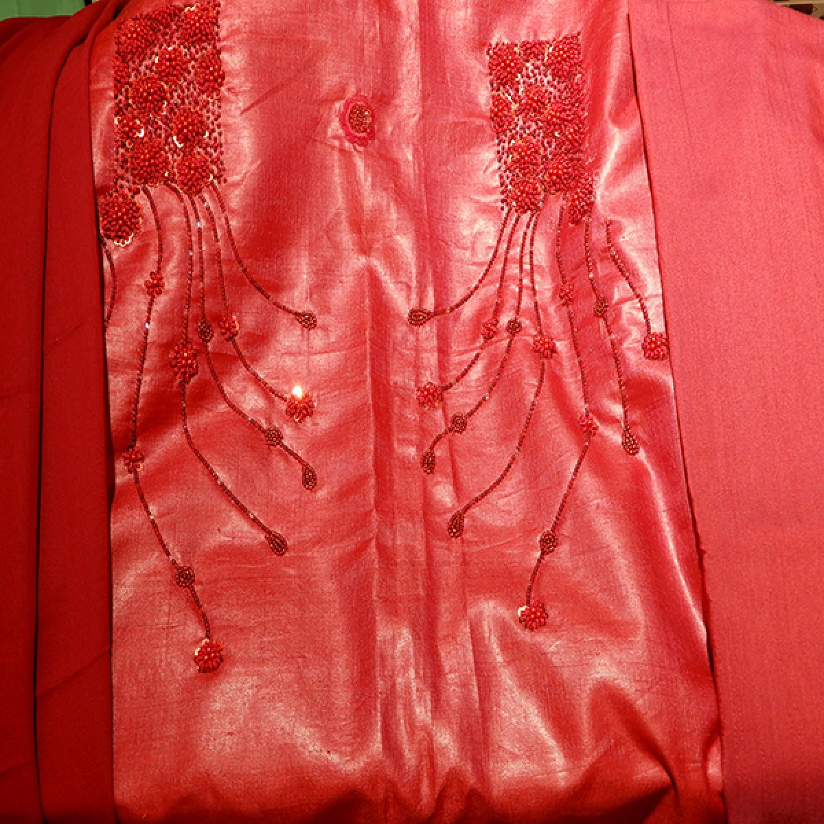 Pure tussar material with sel colour rich work on yoke and self colour shawl and bottom