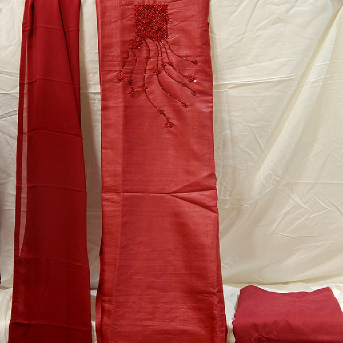 Pure tussar material with sel colour rich work on yoke and self colour shawl and bottom