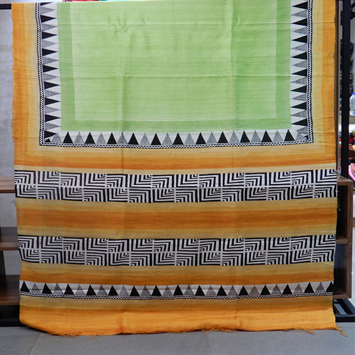 Pure Raw Silk saree with warm colours and printed border.Blouse piece attached.