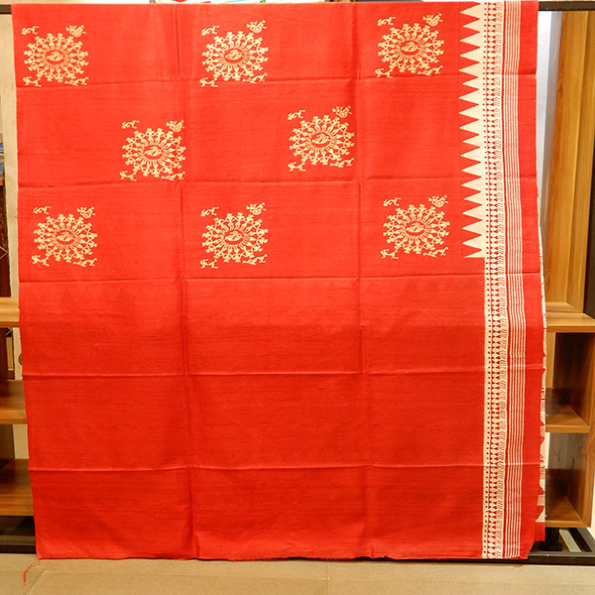 Pure Raw Silk saree with warm colours and printed border.Blouse piece attached.